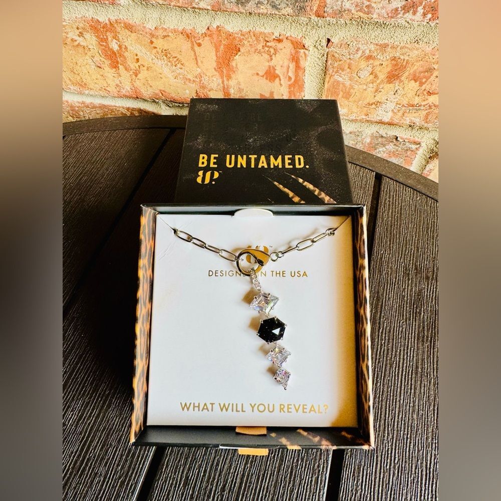 Bomb Party Untamed NK30368 Drip with Bite Necklace in Rhodium Plating.